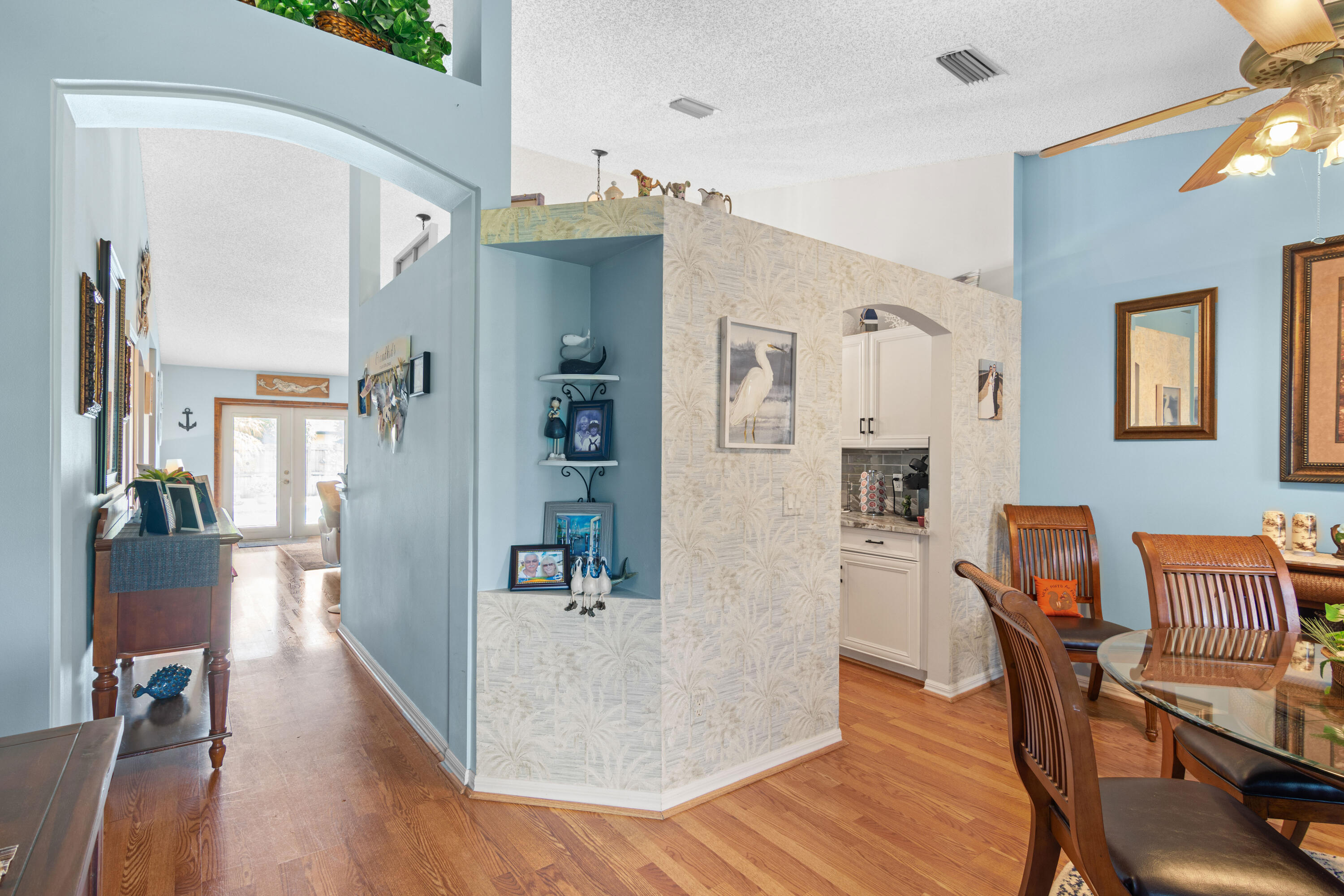 1817 Southwest Davis Street Port St. Lucie, FL 34953 - Photo 6 of 52 a view of kitchen with furniture and wooden floor