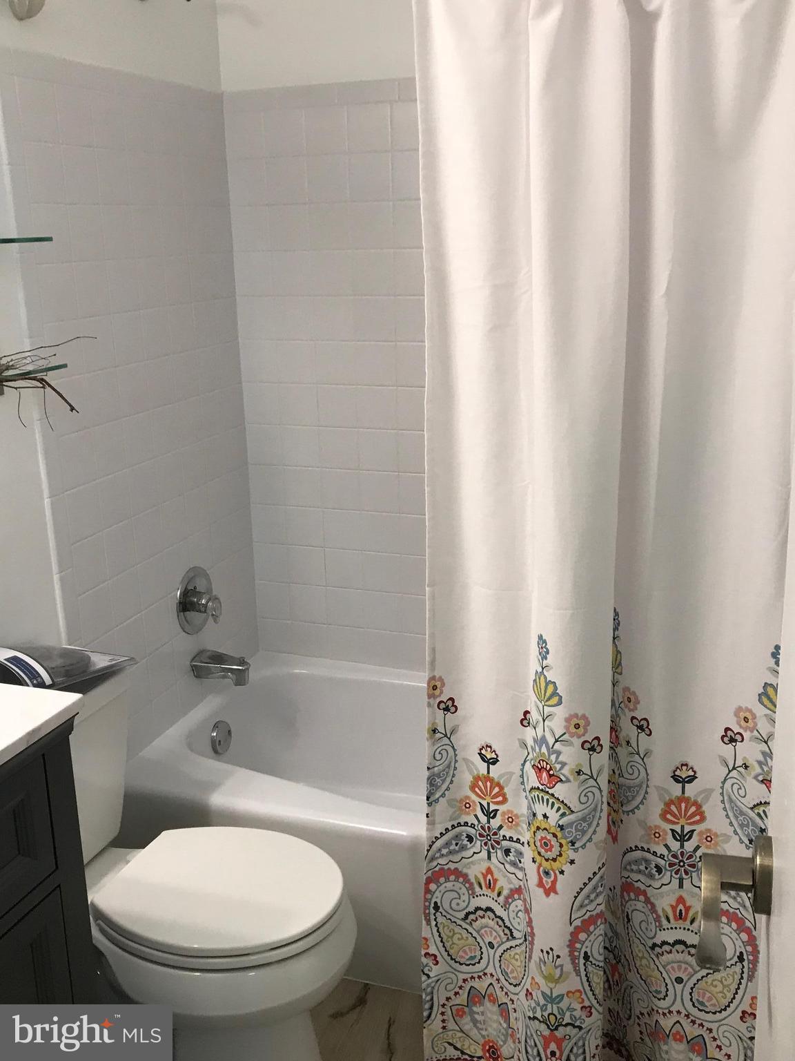 10712 Kings Riding Way, Unit T115 Rockville, MD 20852 - Photo 16 of 27 Bath with new Koehler toilet.
