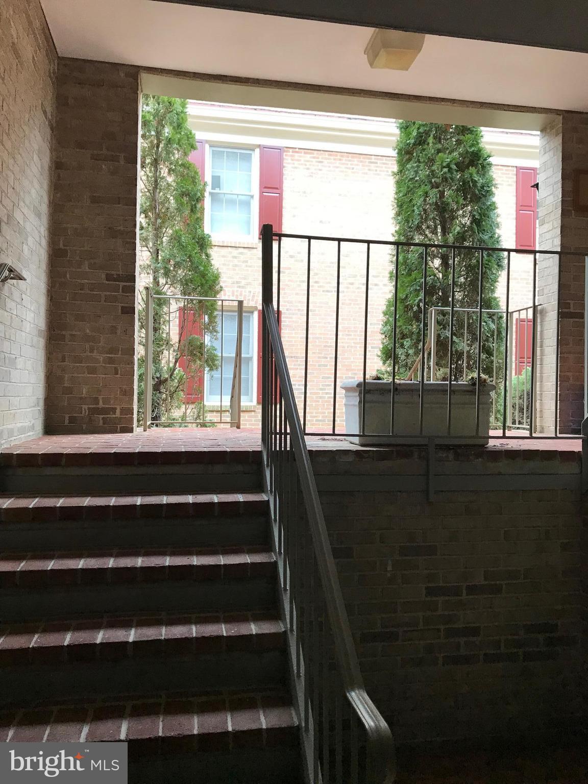 10712 Kings Riding Way, Unit T115 Rockville, MD 20852 - Photo 21 of 27 Stairs exiting the unit, hurry back!