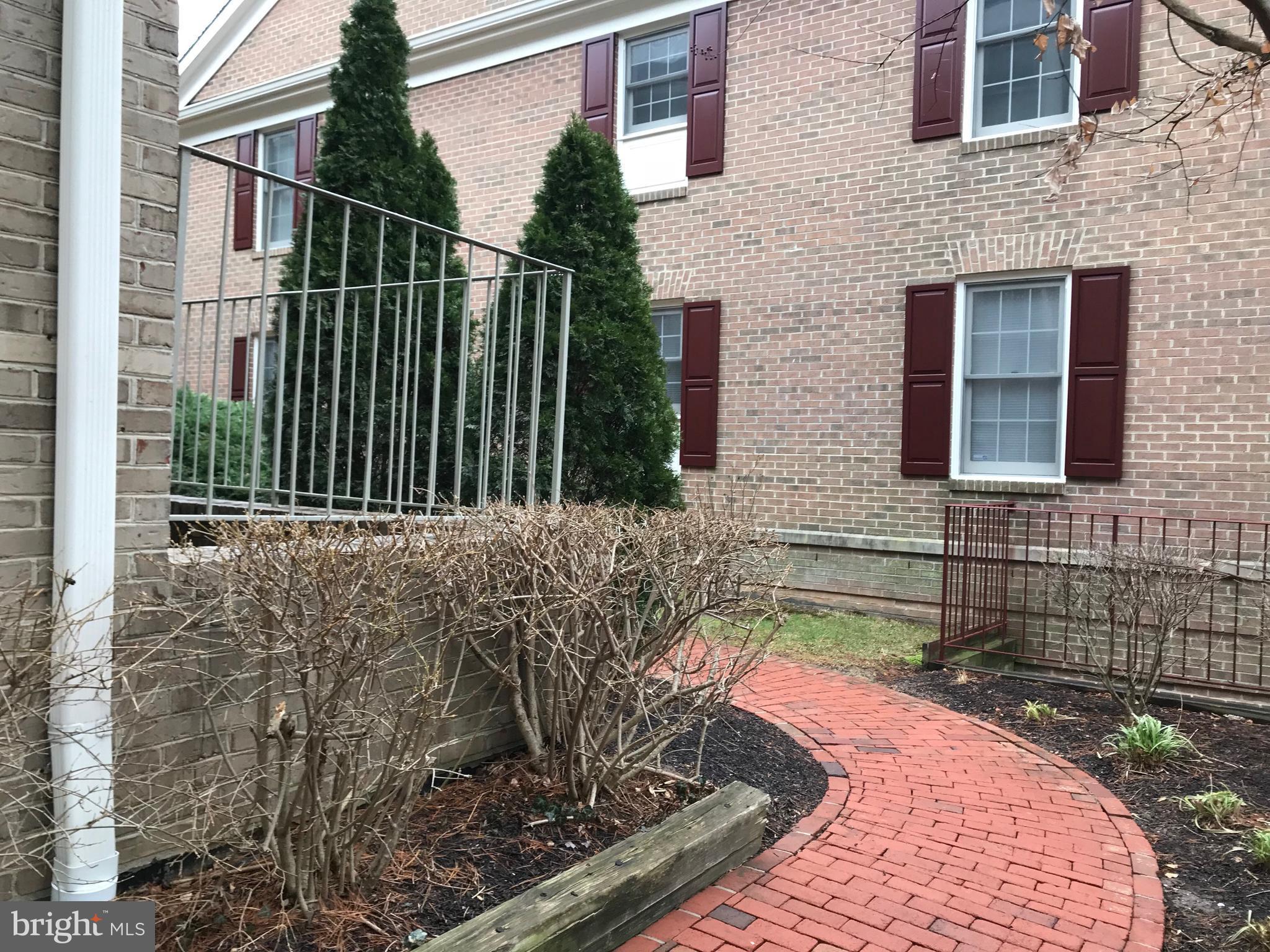 10712 Kings Riding Way, Unit T115 Rockville, MD 20852 - Photo 22 of 27 Path to trash room