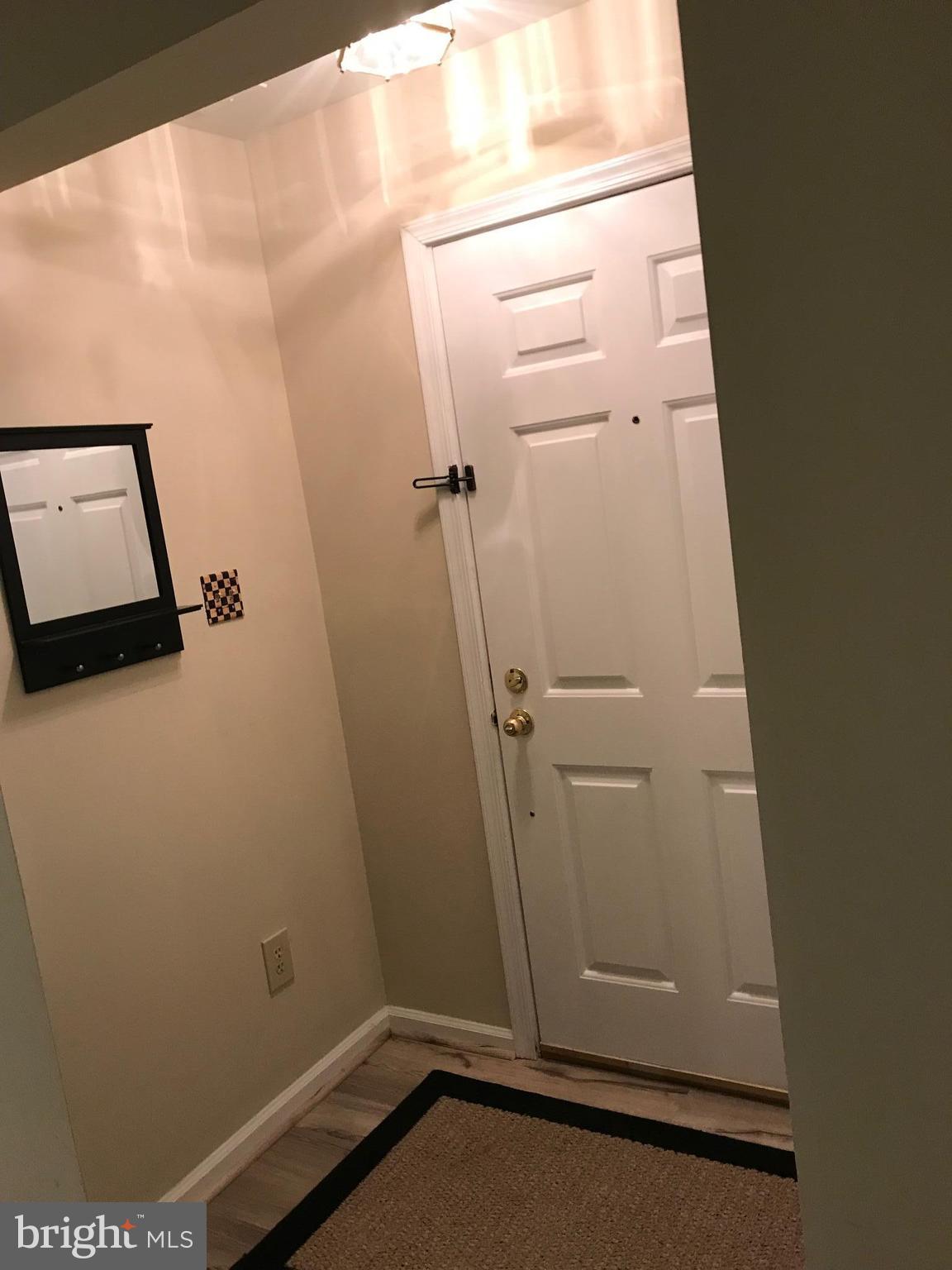 10712 Kings Riding Way, Unit T115 Rockville, MD 20852 - Photo 8 of 27 Entry to Living Room, this place is beautiful!