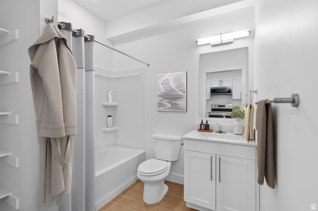 2085 North Main Street, Unit 409 Sunset, UT 84015 - Photo 4 of 10 Contemporary bathroom featuring a tub/shower combination with integrated shelving