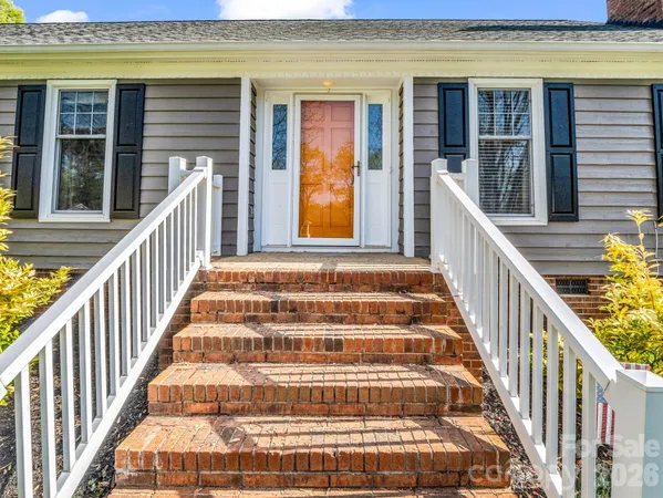 a view of staircase with large window