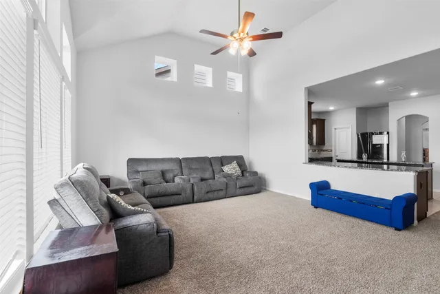 a bathroom with a shower and a sink