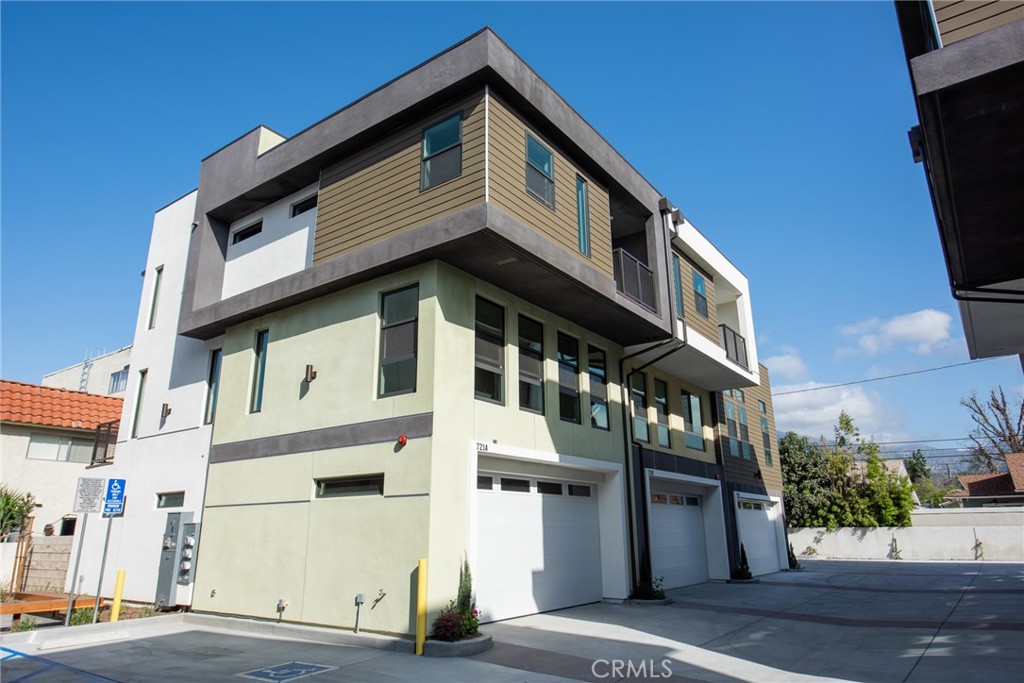 a front view of a building with a street