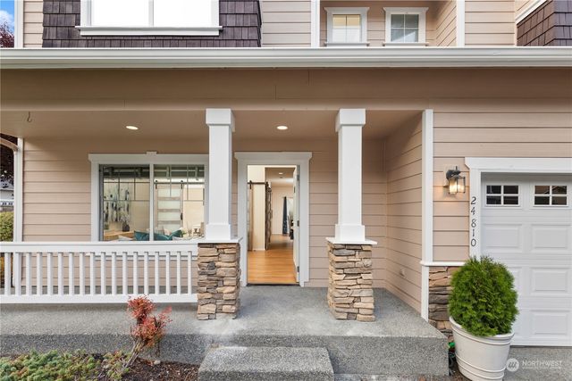 front view of a house with a small garden