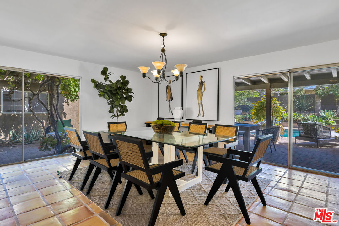 73589 Haystack Road Palm Desert, CA 92260 - Photo 12 of 54 a view of a dining room with furniture window and outside view