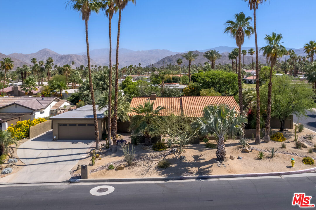 73589 Haystack Road Palm Desert, CA 92260 - Photo 3 of 54 a view of a lake with a mountain view