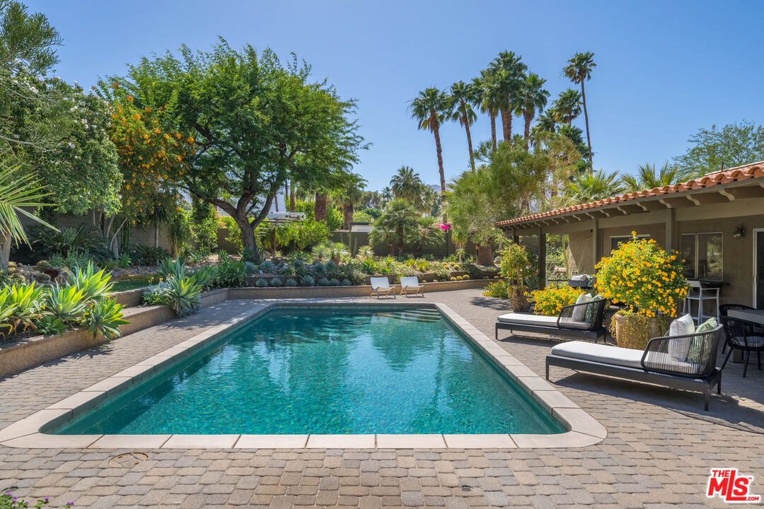 73589 Haystack Road Palm Desert, CA 92260 - Photo 43 of 54 a view of swimming pool with seating space