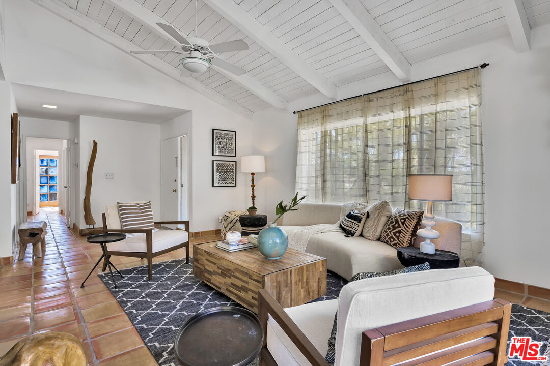 73589 Haystack Road Palm Desert, CA 92260 - Photo 8 of 54 a living room with furniture and wooden floor