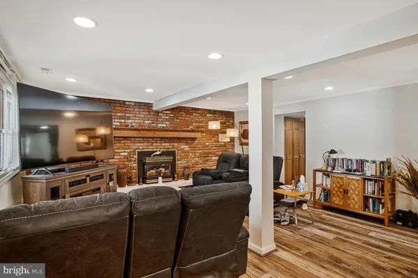 a media room with lots of chairs and a projector screen