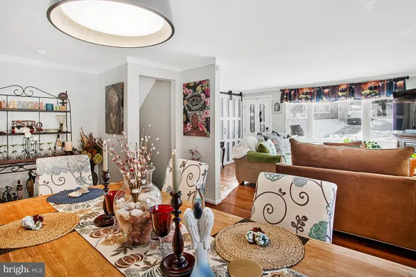 a living room filled with furniture and a table