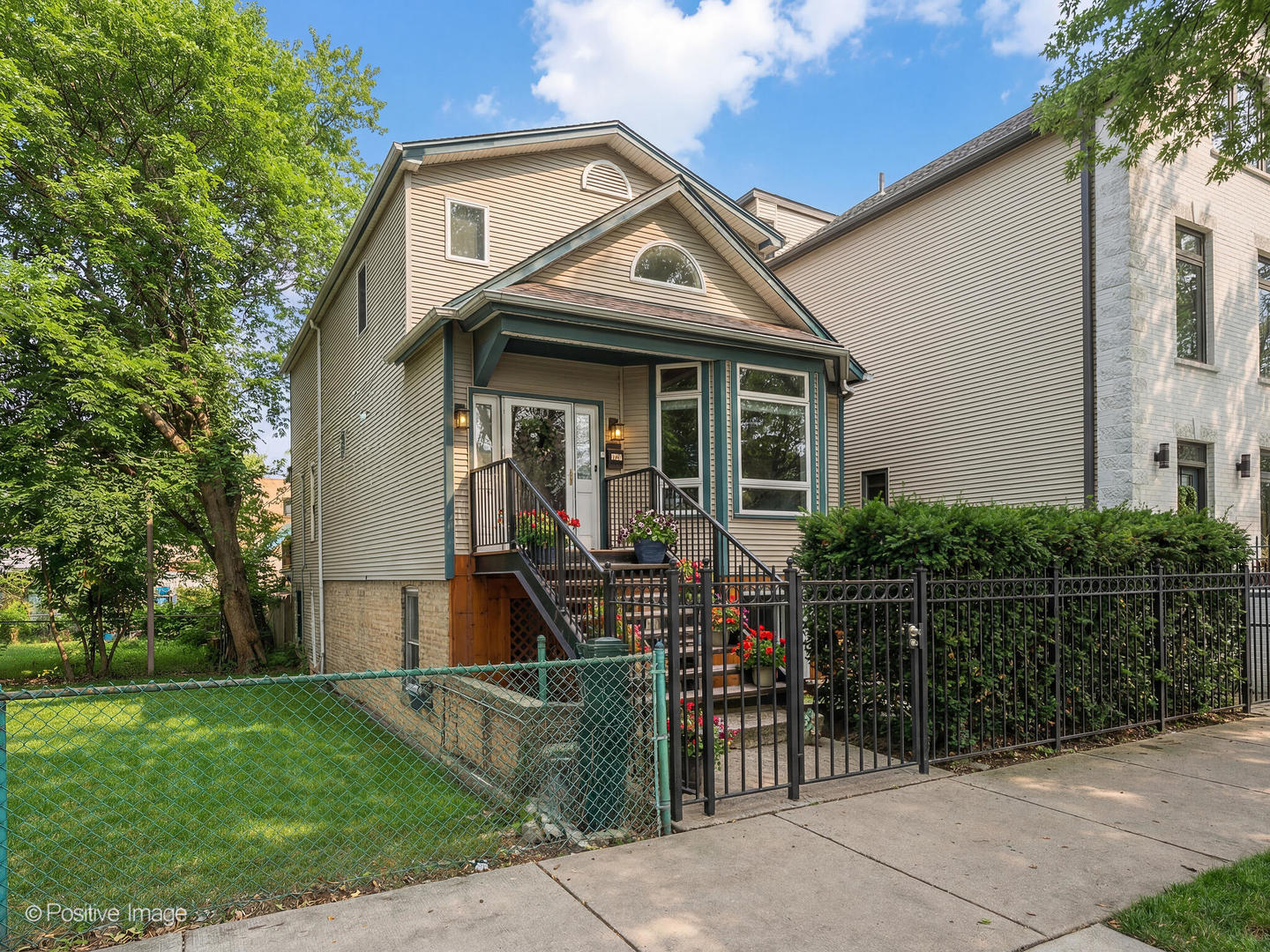 1720 West Altgeld Street Chicago, IL 60614 - Photo 1 of 11 front view of house with a small yard