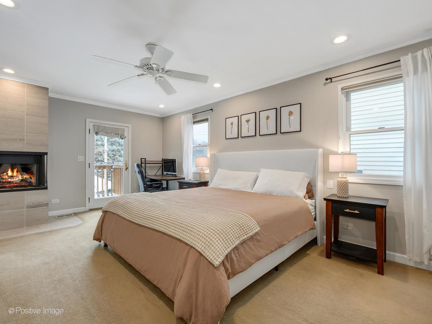 1720 West Altgeld Street Chicago, IL 60614 - Photo 5 of 11 a large bedroom with a bed and a fireplace