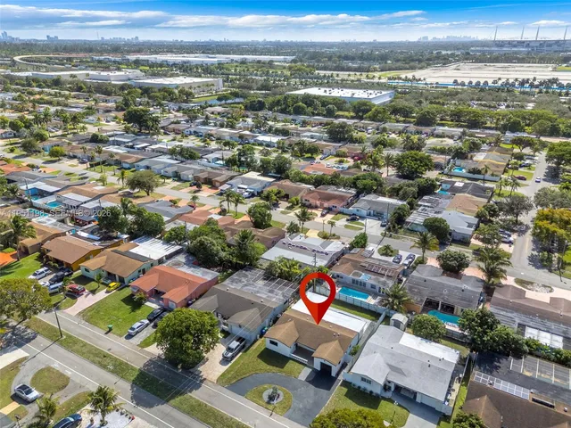 an aerial view of a city with lots of residential buildings