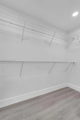 a view of a room with racks on the wall