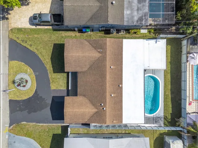 a picture of a bathroom with a sink and a mirror