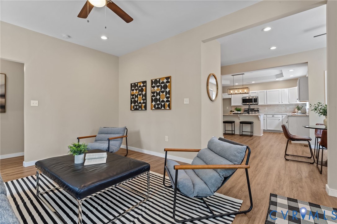 2701 Perdue Avenue Chester, VA 23831 - Photo 18 of 54 a living room with furniture a rug and white walls