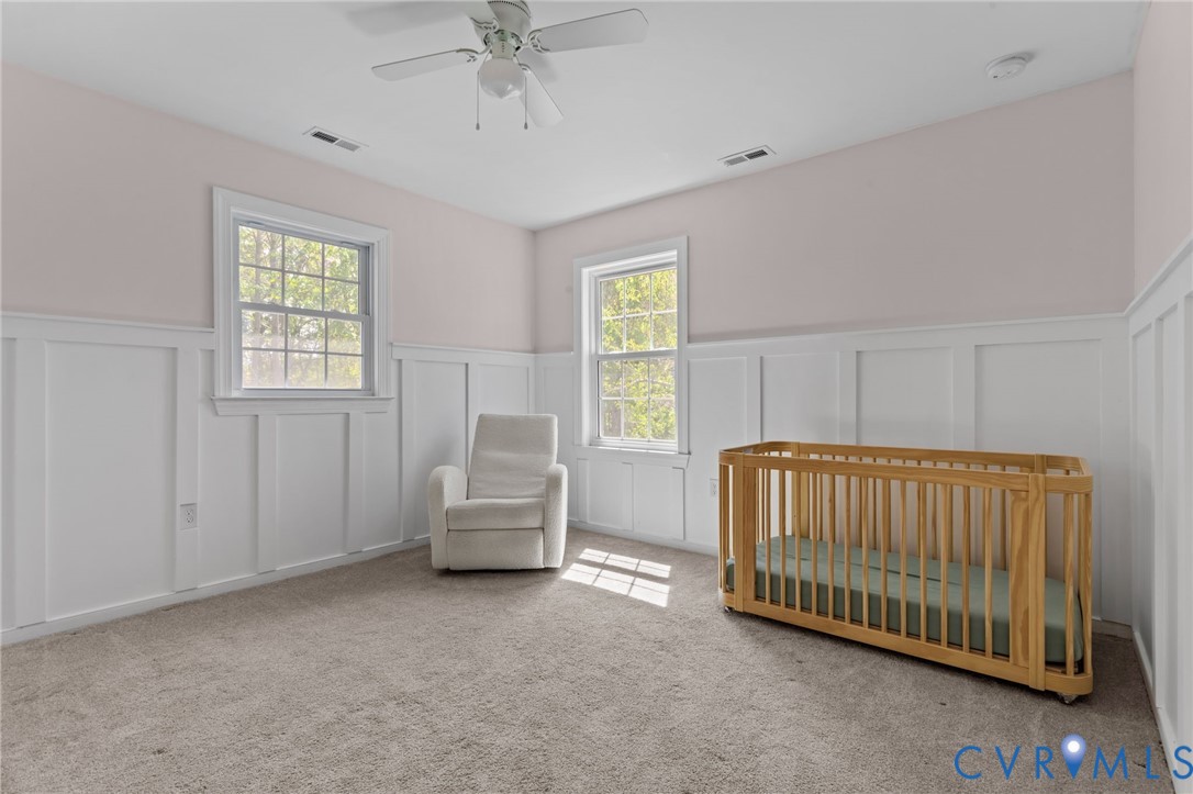 2701 Perdue Avenue Chester, VA 23831 - Photo 32 of 54 a bedroom with a bed and window