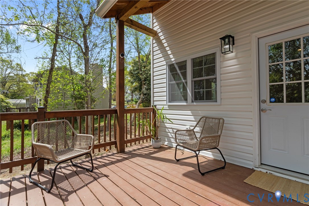 2701 Perdue Avenue Chester, VA 23831 - Photo 38 of 54 a view of a chairs on the deck
