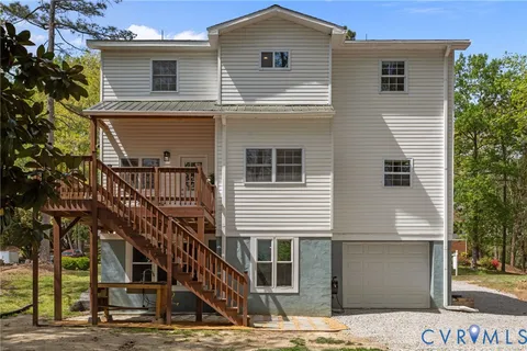 a view of a house with a park