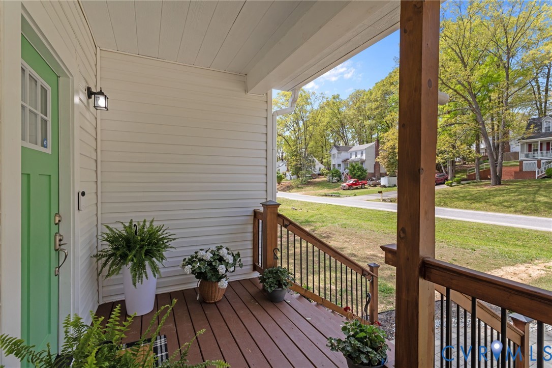 2701 Perdue Avenue Chester, VA 23831 - Photo 4 of 54 a view of a balcony with floor to ceiling windows with wooden floor