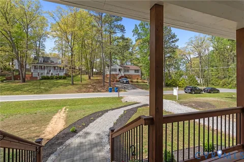a aerial view of a house with swimming pool