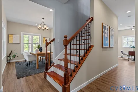 a view of a dining room with furniture and window