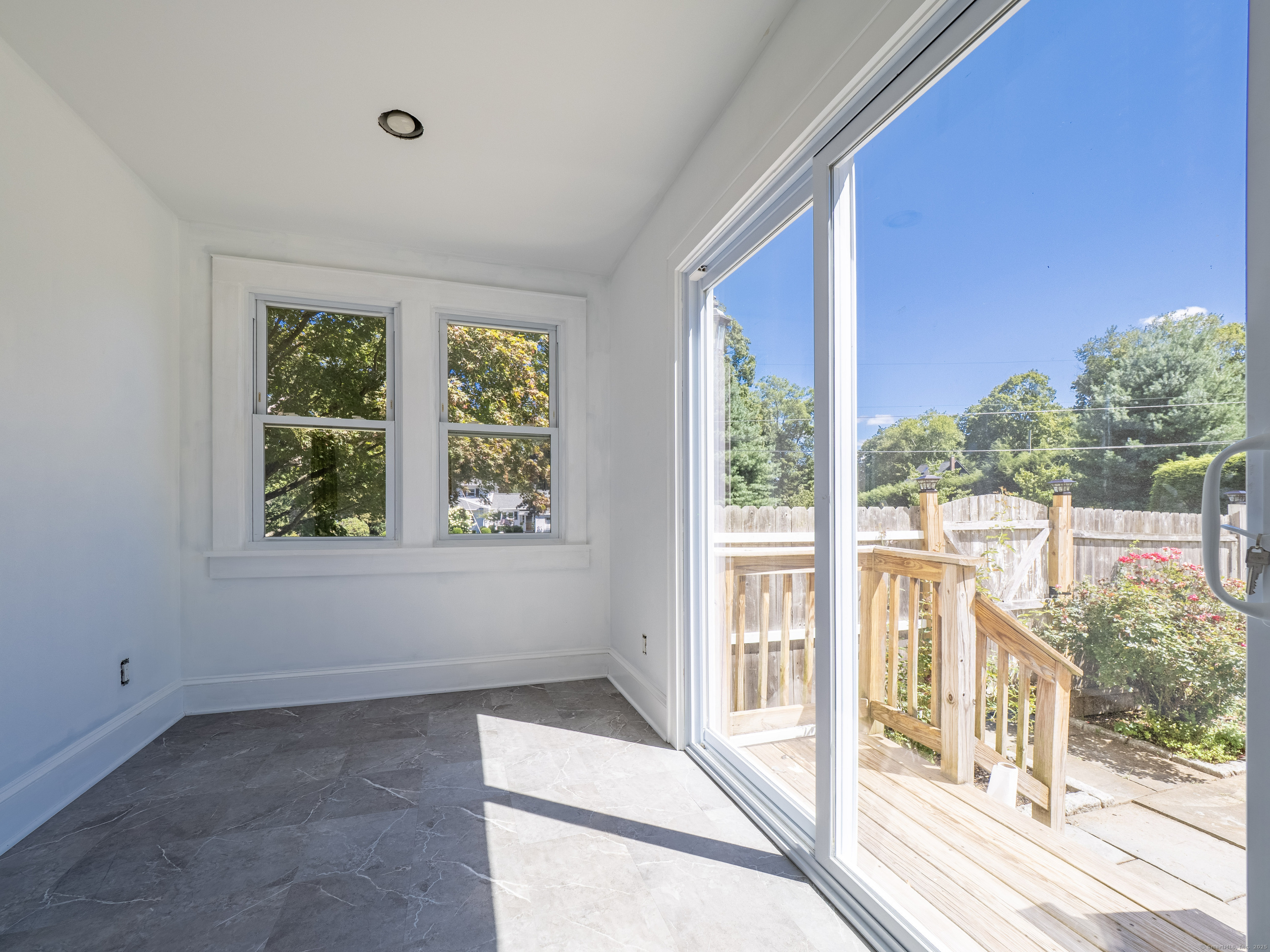 159 Barry Avenue Ridgefield, CT 06877 - Photo 12 of 39 a view of a room that has a window in it