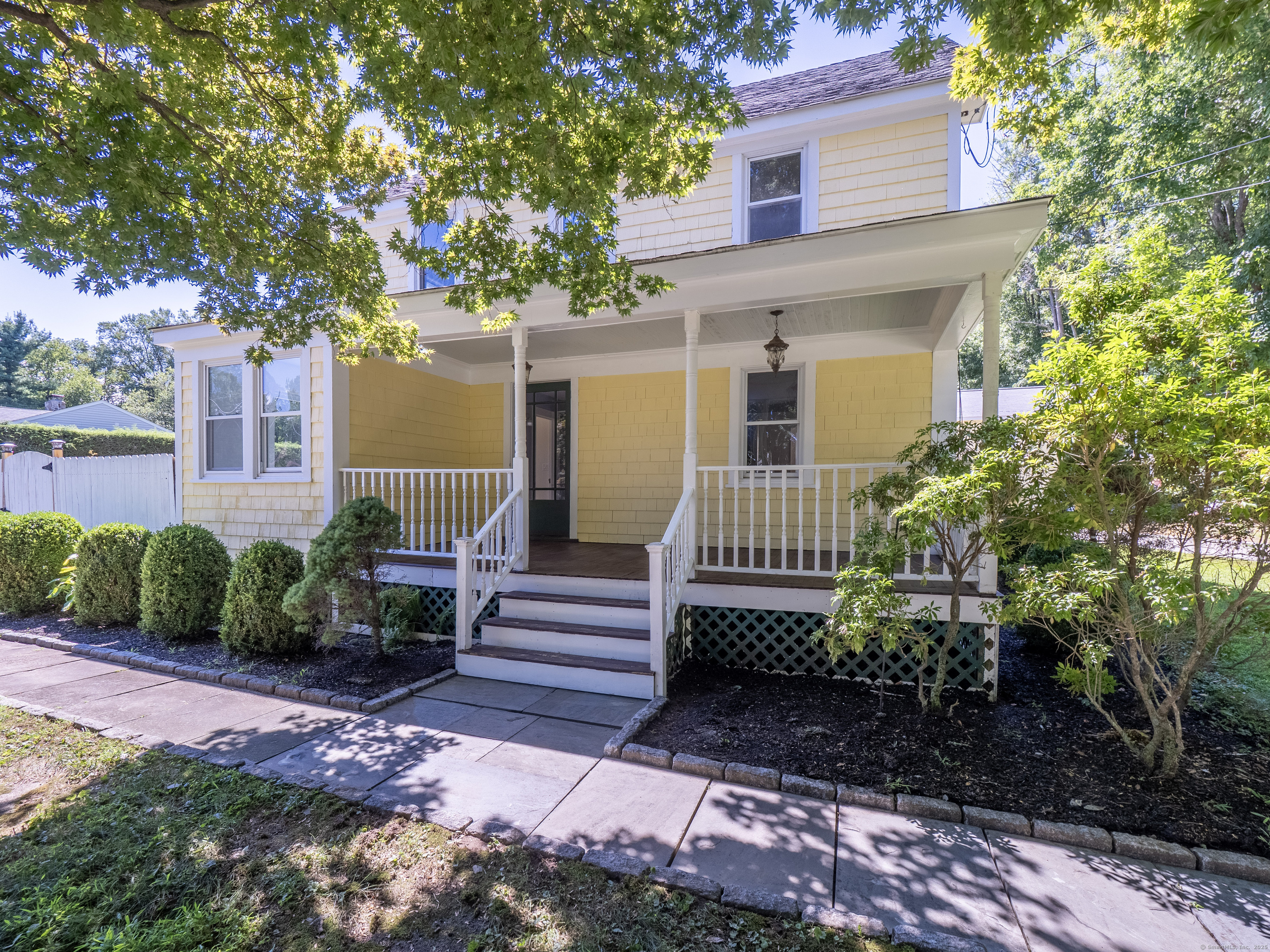 159 Barry Avenue Ridgefield, CT 06877 - Photo 2 of 39 a view of a house with a yard plants and large tree