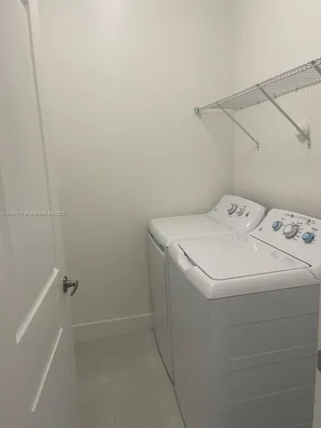 a view of a room with an empty space