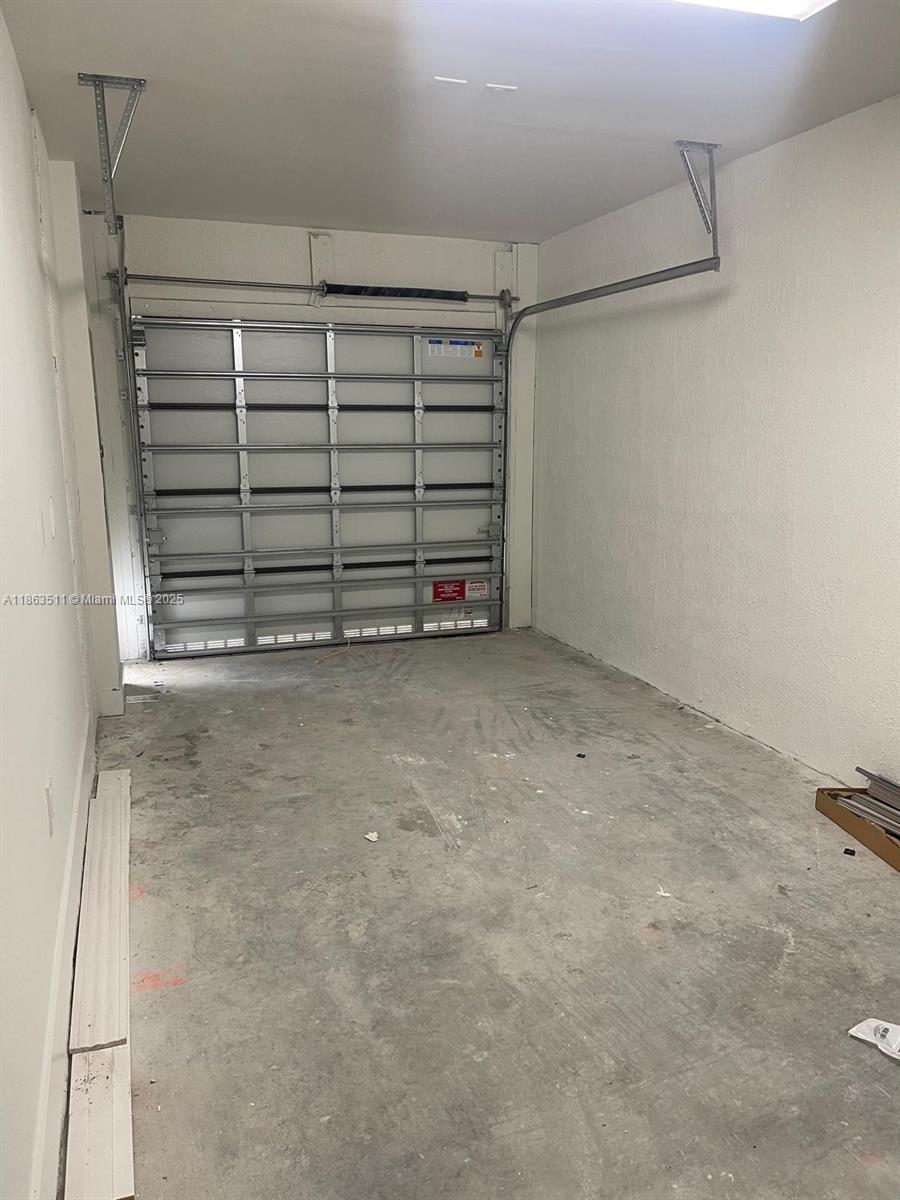 18988 Southwest 344th Terrace Homestead, FL 33034 - Photo 17 of 28 a view of a room with an empty space