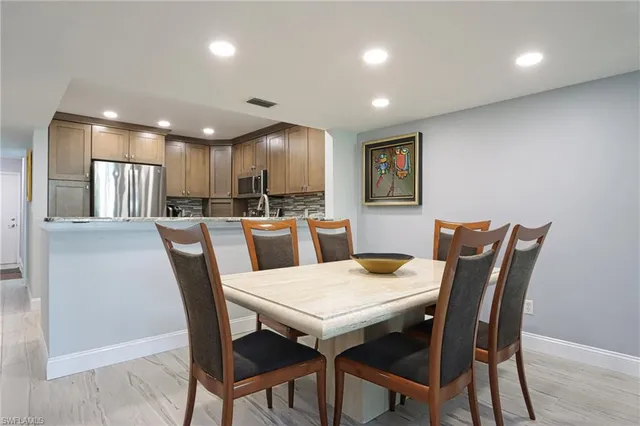 a view of a dining room with furniture
