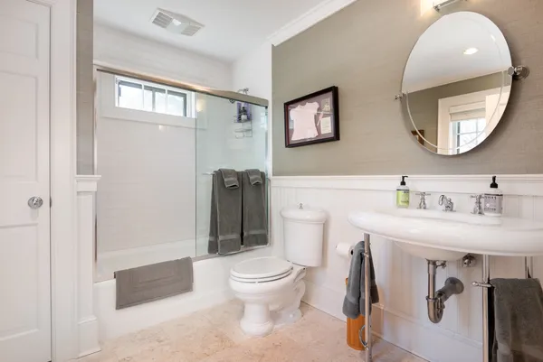 a utility room with a sink dryer and washer