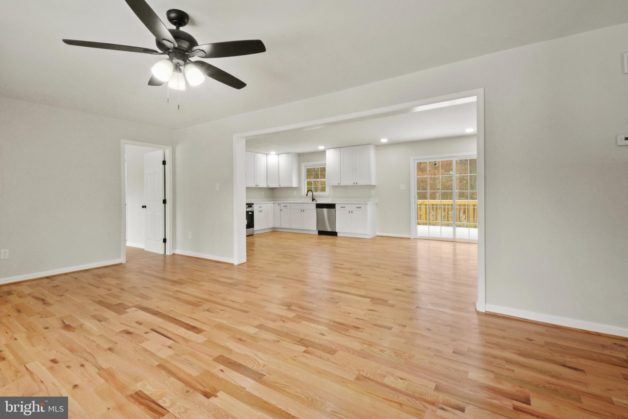 18487 Clay Hill Road Stevensburg, VA 22741 - Photo 11 of 41 a view of empty room with wooden floor and window