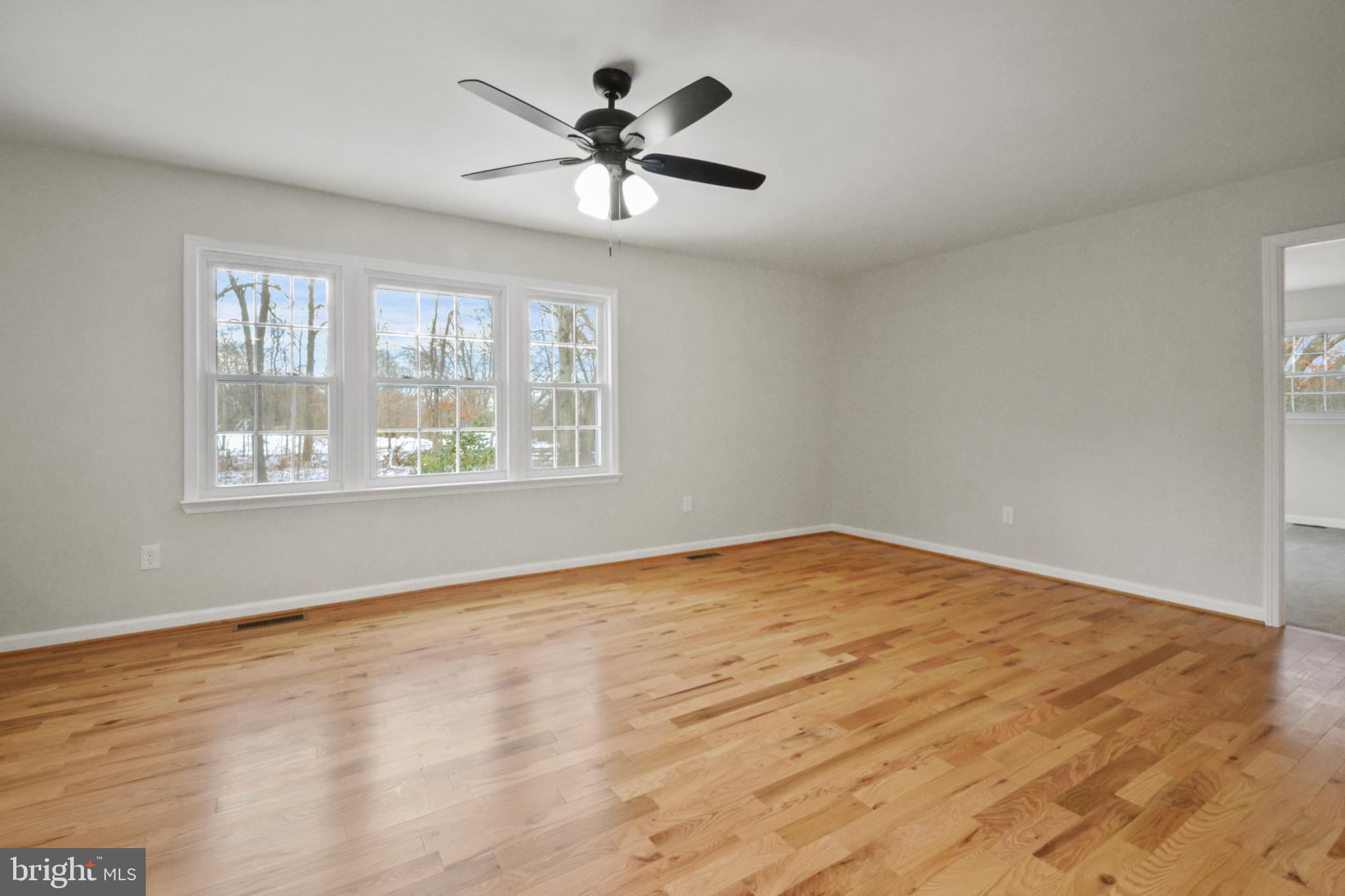 18487 Clay Hill Road Stevensburg, VA 22741 - Photo 14 of 41 a view of an empty room with a window