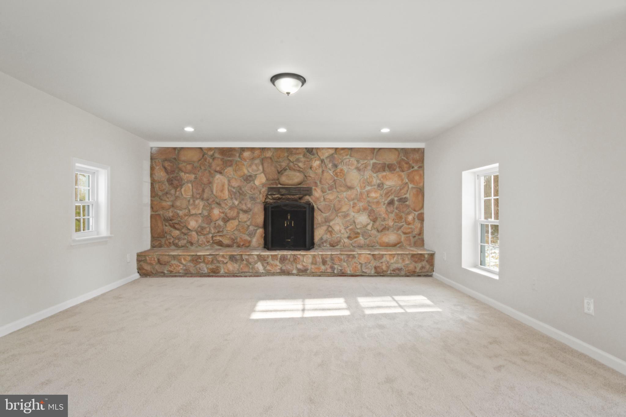 18487 Clay Hill Road Stevensburg, VA 22741 - Photo 32 of 41 an entryway with fireplace