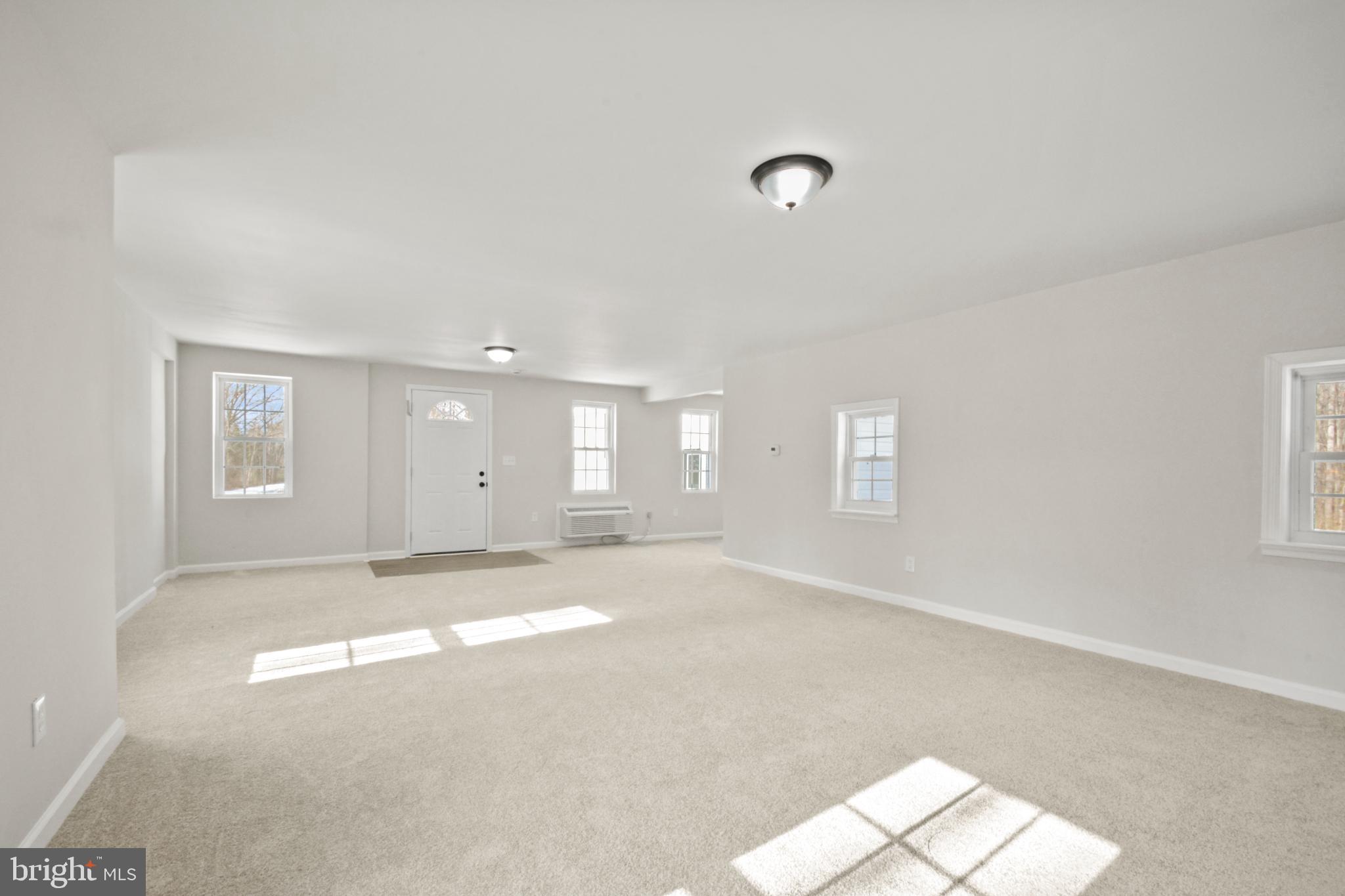 18487 Clay Hill Road Stevensburg, VA 22741 - Photo 33 of 41 an empty room with windows