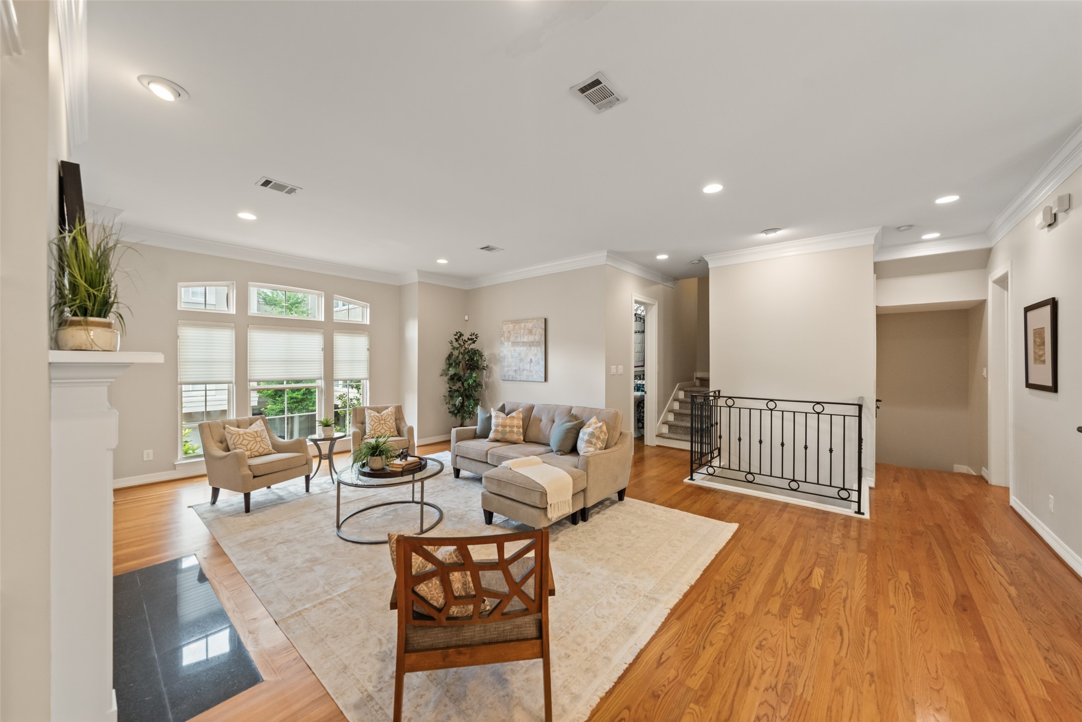 2708 Wroxton Road West University Place, TX 77005 - Photo 17 of 22 Bright living room with elegant wrought iron accents.