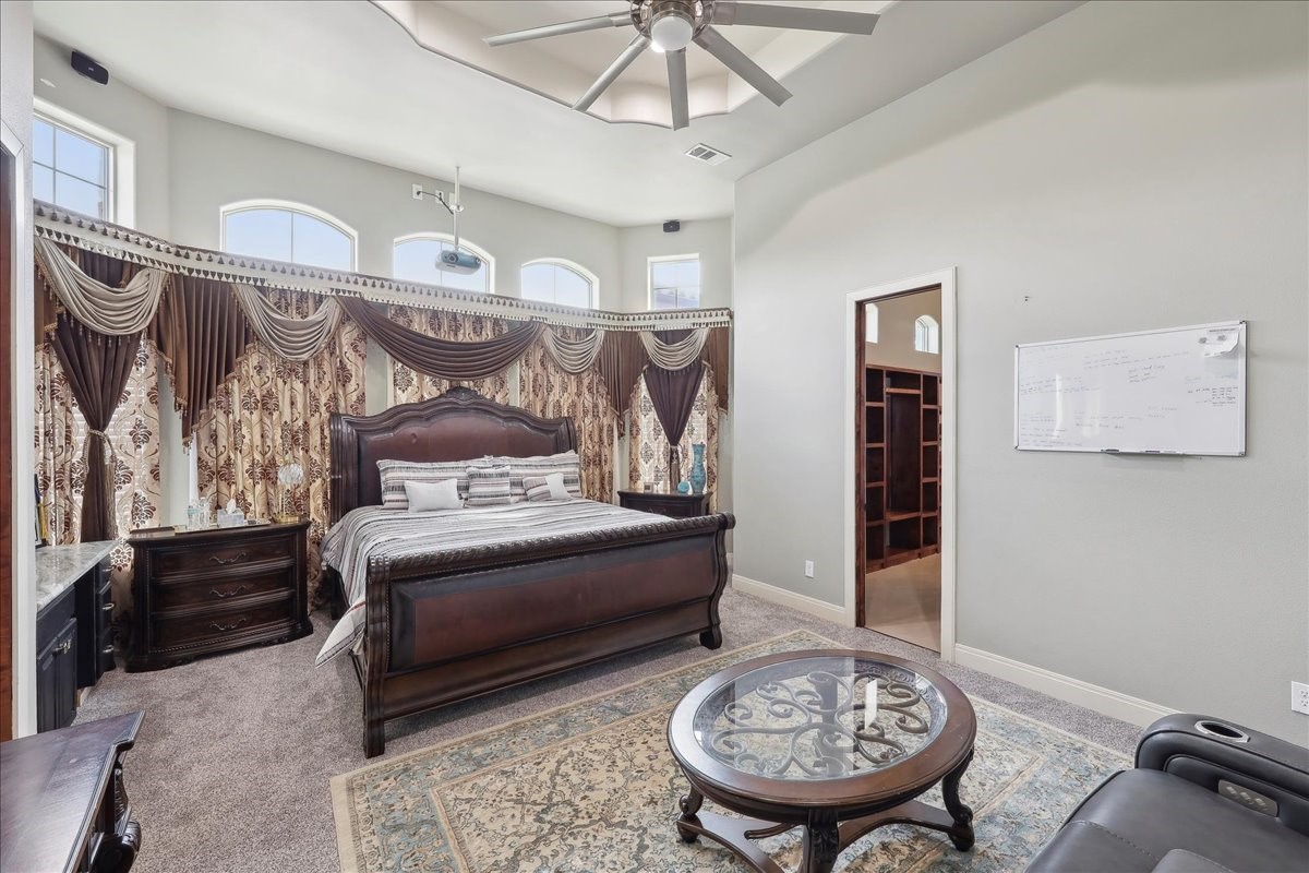 12460 Keith Road Beaumont, TX 77713 - Photo 20 of 40 a view of a bedroom with a bed and furniture