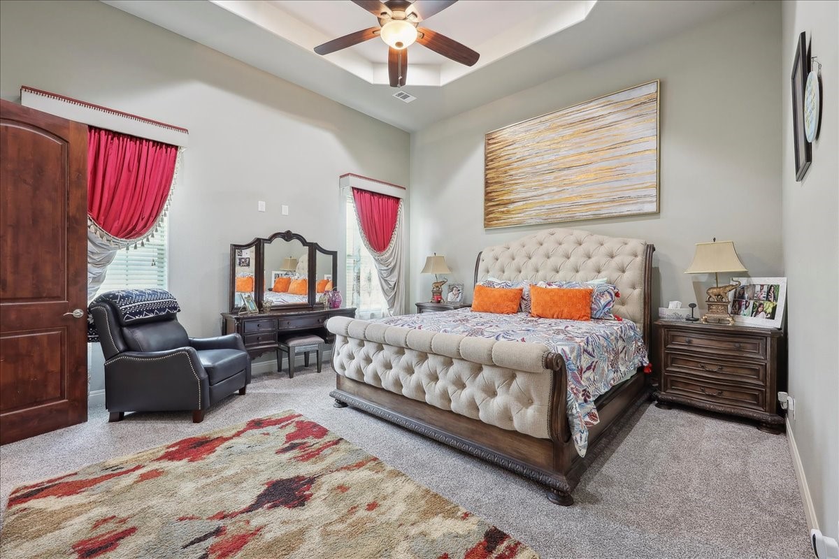 12460 Keith Road Beaumont, TX 77713 - Photo 22 of 40 a bedroom with a bed couch and a window