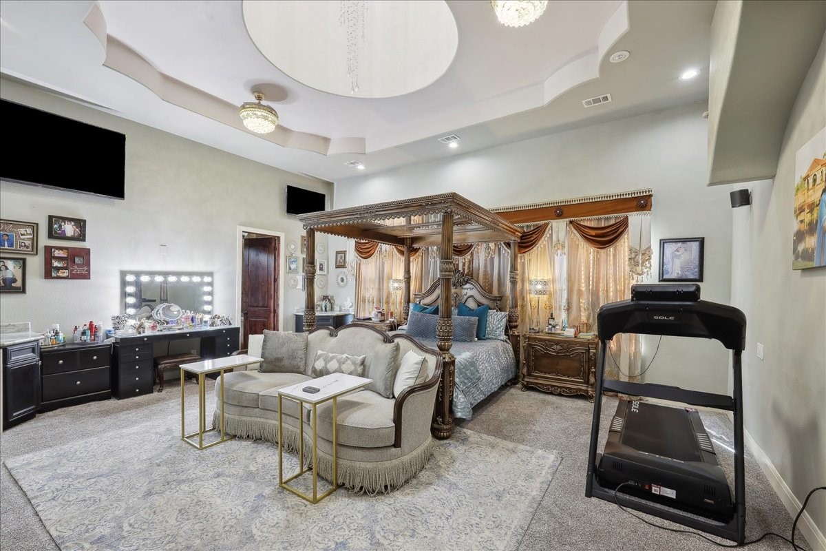 12460 Keith Road Beaumont, TX 77713 - Photo 29 of 40 a living room with furniture and a flat screen tv