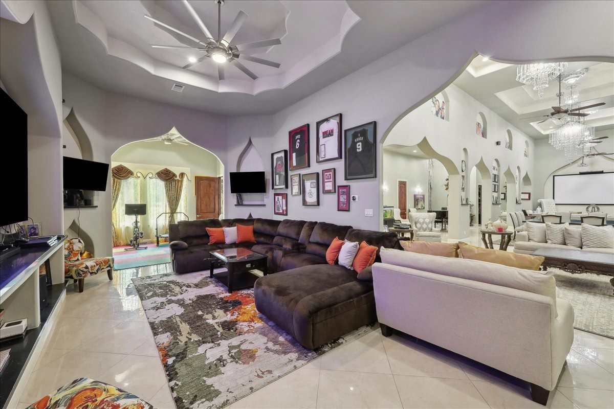12460 Keith Road Beaumont, TX 77713 - Photo 9 of 40 a living room with furniture fireplace and a large window