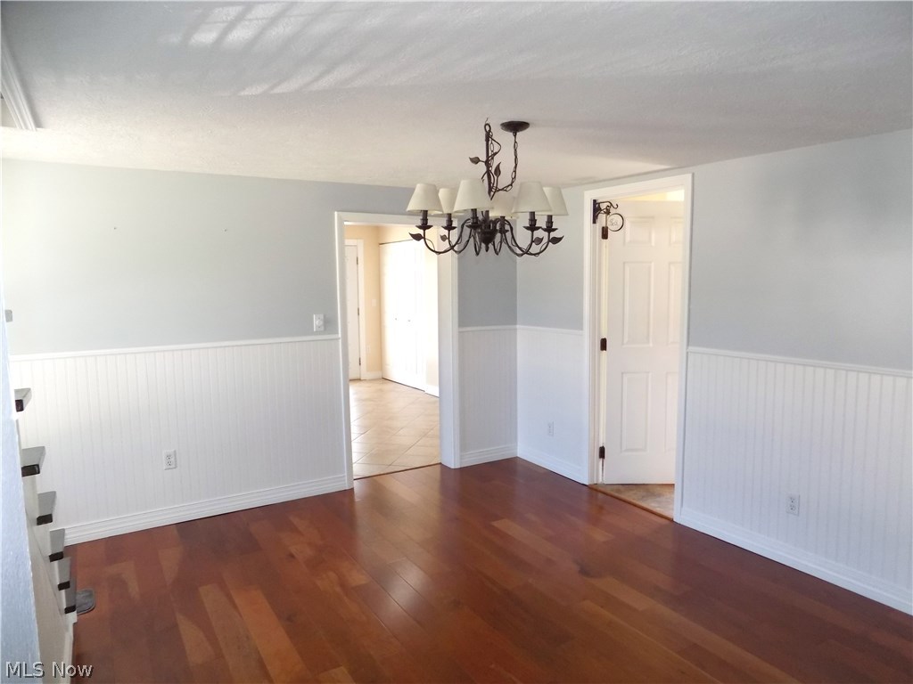 10808 Green Road Wakeman, OH 44889 - Photo 8 of 27 Formal dining room with wood floor.