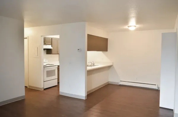 a view of an empty room with a bathroom