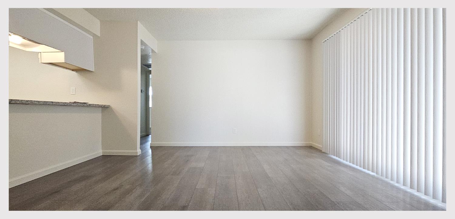 5130 Rescue Court Sacramento, CA 95841 - Photo 15 of 47 a view of an empty room with wooden floor and a window