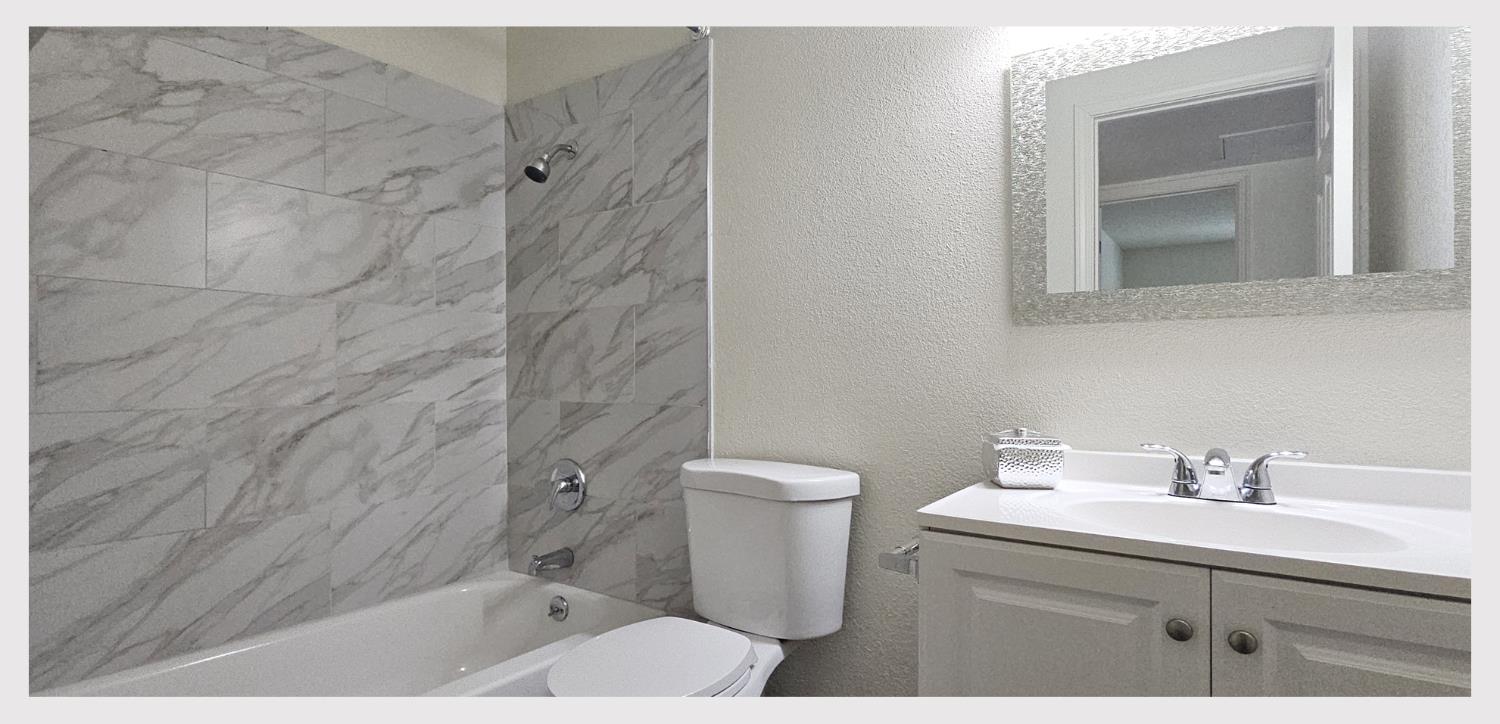 5130 Rescue Court Sacramento, CA 95841 - Photo 18 of 47 a bathroom with a sink a toilet and shower