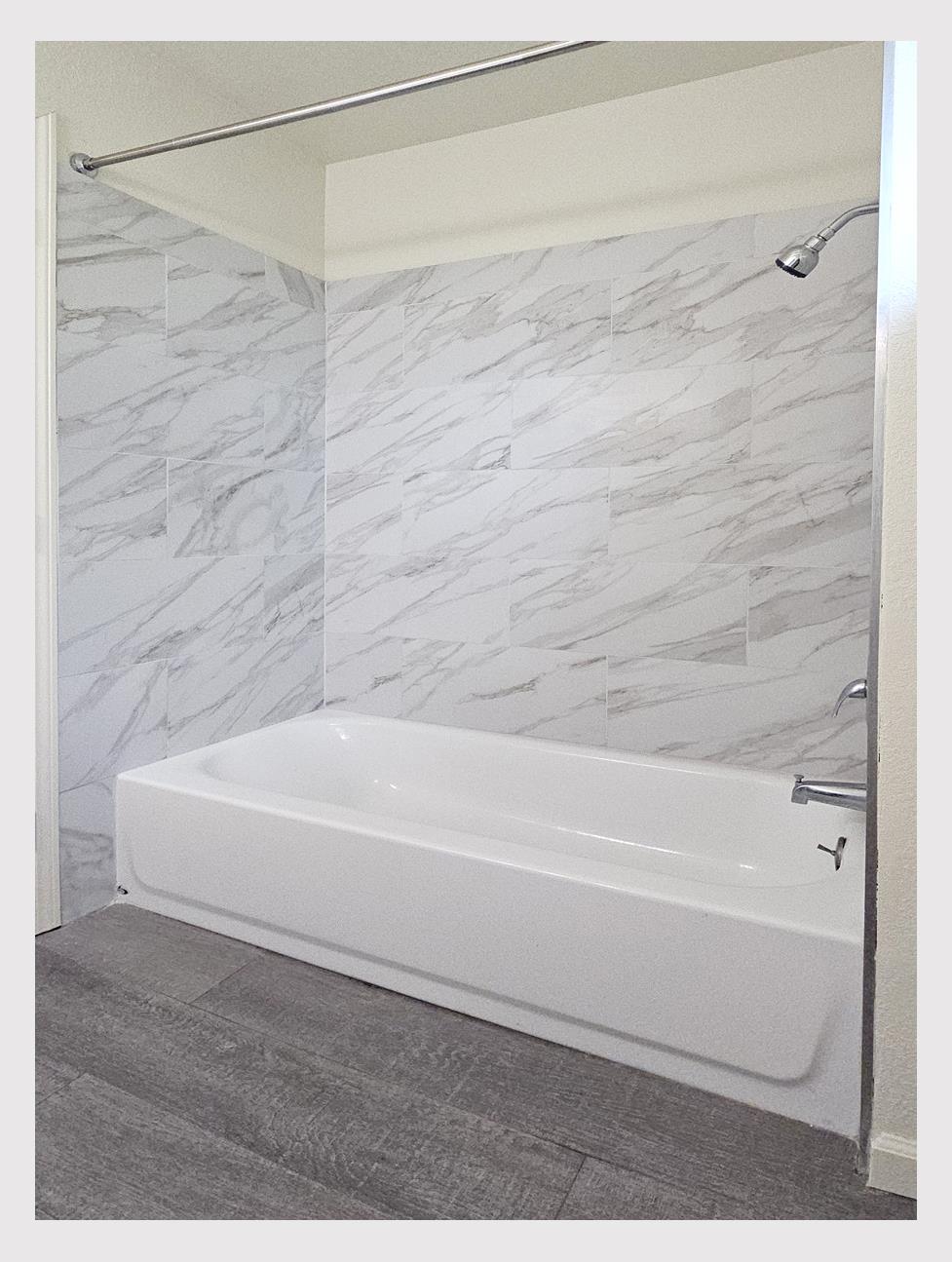 5130 Rescue Court Sacramento, CA 95841 - Photo 19 of 47 a bathroom with a shower and a bath tub