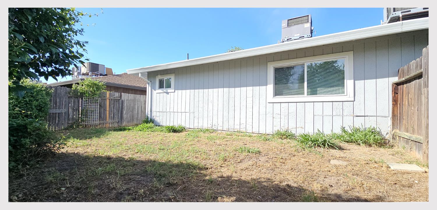 5130 Rescue Court Sacramento, CA 95841 - Photo 32 of 47 a view of backyard of house with wooden fence