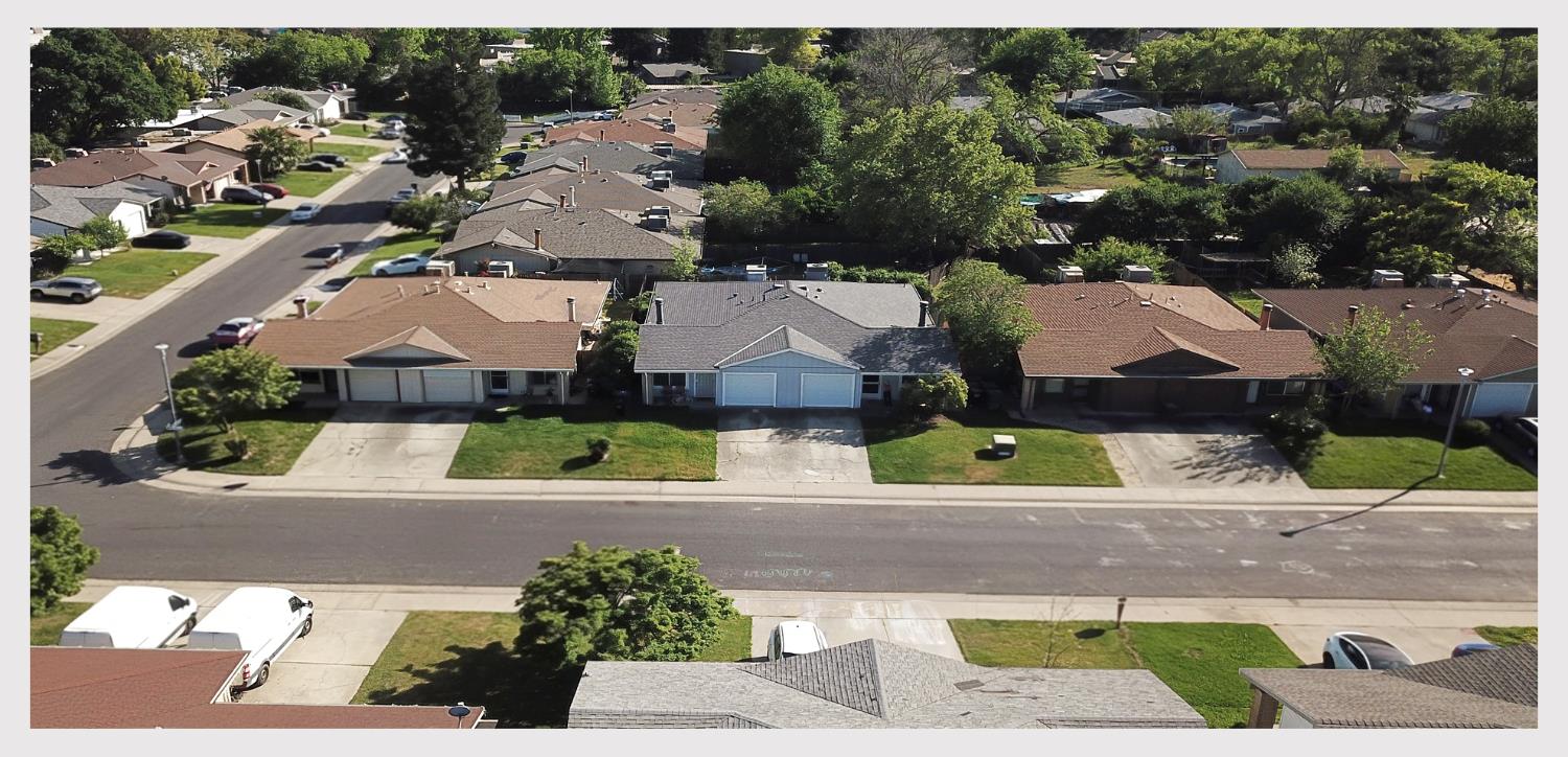 5130 Rescue Court Sacramento, CA 95841 - Photo 42 of 47 an aerial view of a house with a garden and parking space